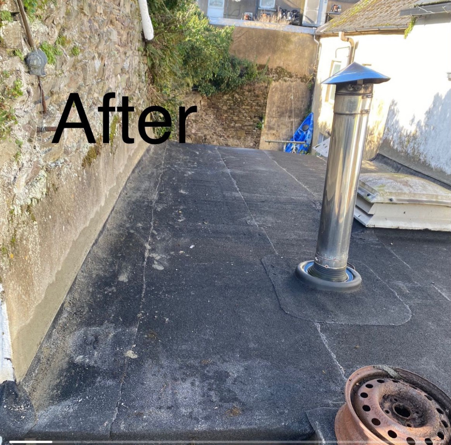 Flat roof after felt renewal