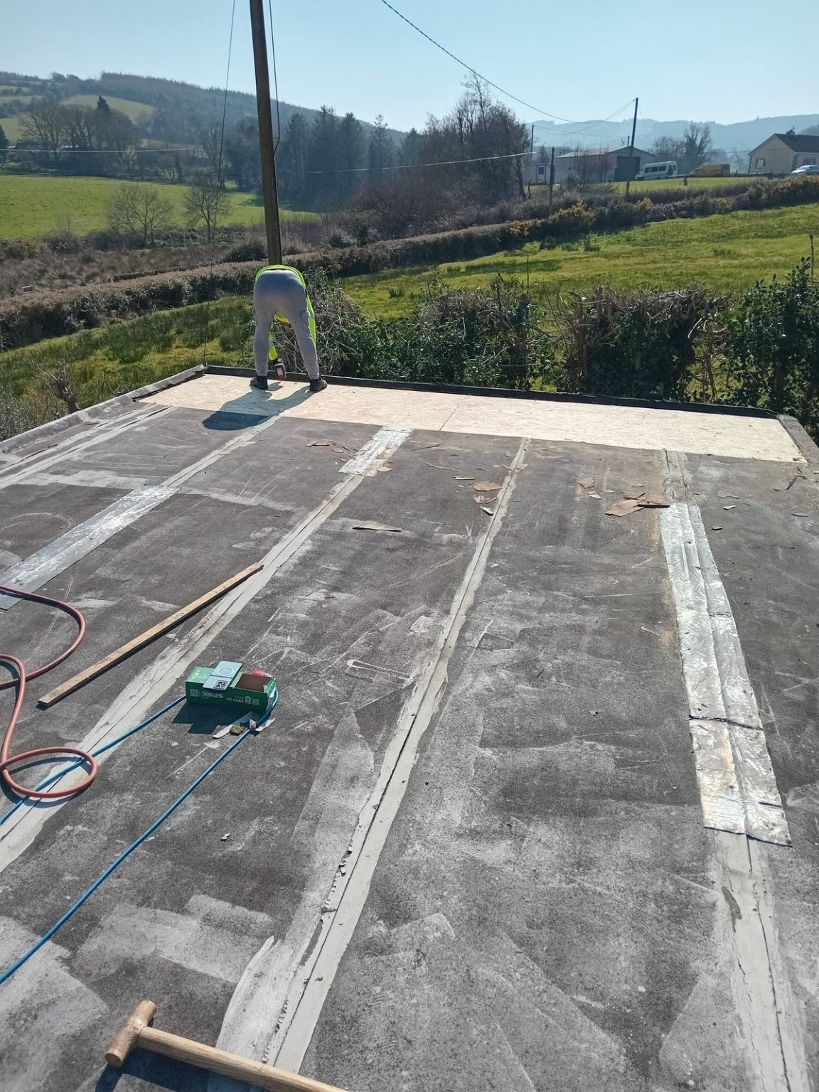 Existing flat roof undergoing deck renewal