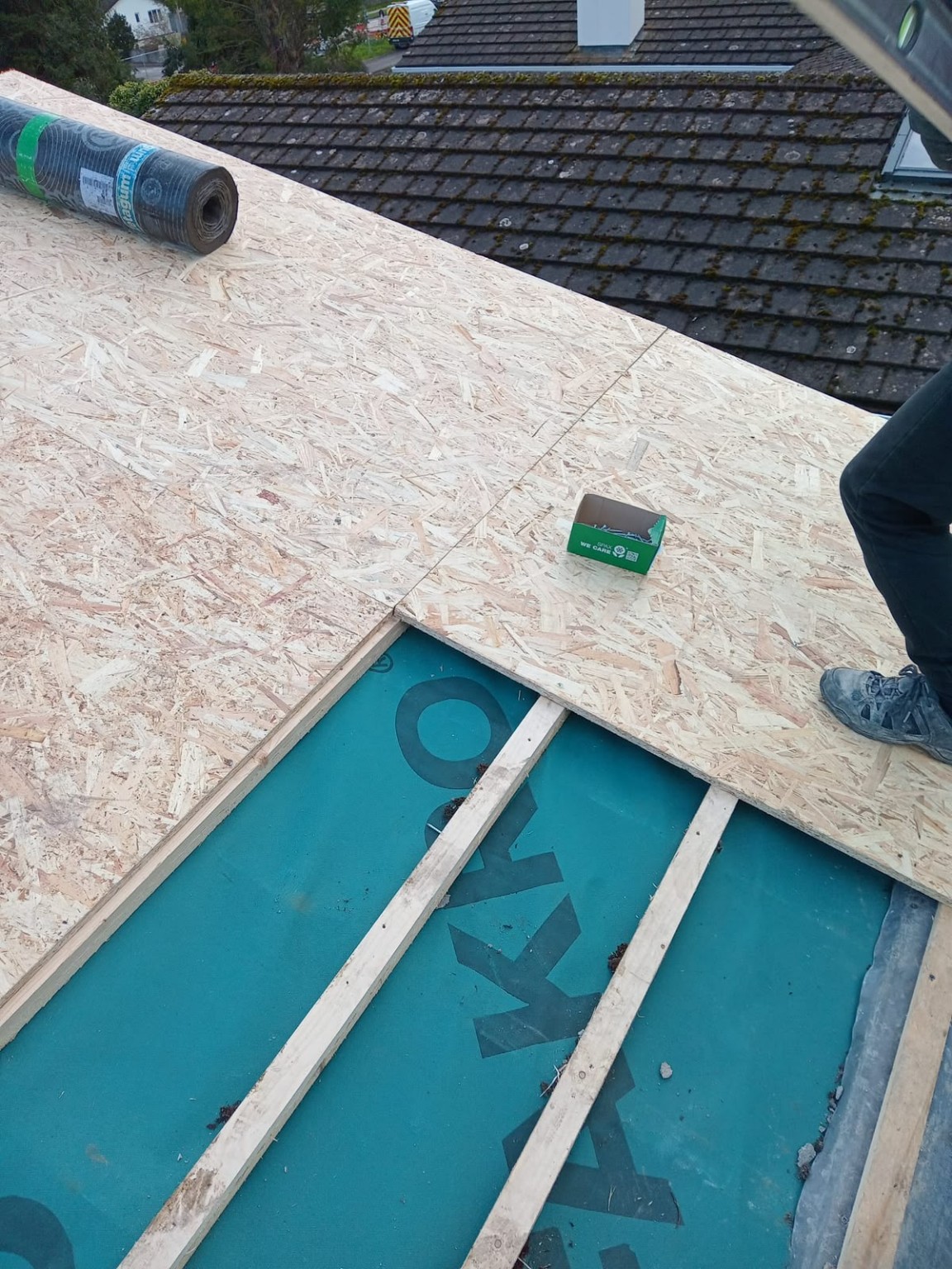 Flat-roof timber deck replacement in progress